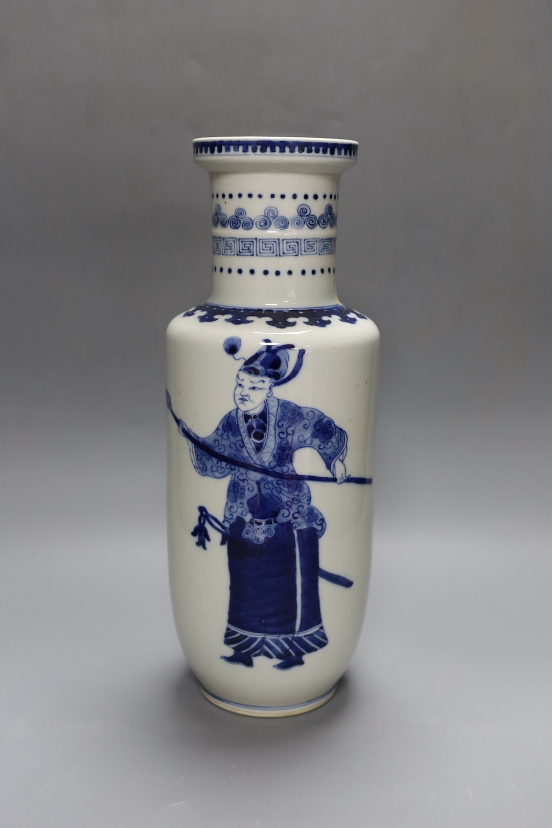 A Chinese blue and white rouleau vase, 35 cms.